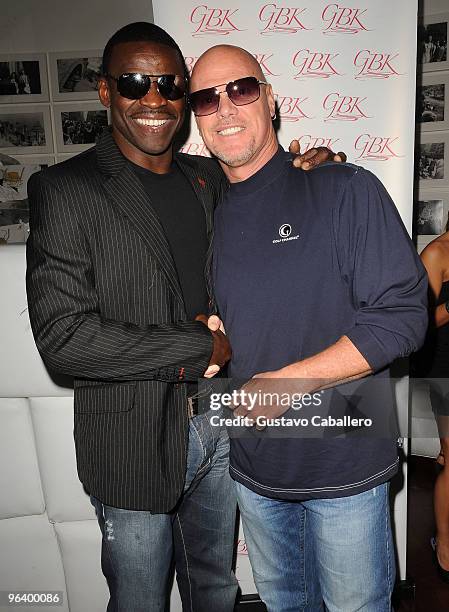 Former NFL players Michael Irvin and Jim McMahon attend the GBK Gift Lounge at Player's Press Pre-Super Bowl Party at Sagamore Hotel on February 3,...