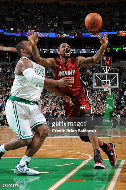 Udonis Haslem of the Miami Heat drives to the basket against Glen Davis of the Boston Celtics on February 3, 2010 at the TD Garden in Boston,...