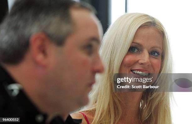 Tareq Salahi speaks while being watched by his wife Michaele Salahi at a press conference with the USA Polo Team on February 4, 2010 in Melbourne,...