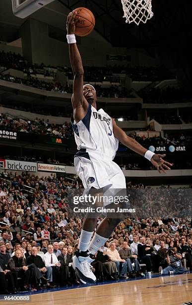 Josh Howard of the Dallas Mavericks goes in for the layup against the Golden State Warriors during a game at the American Airlines Center on February...