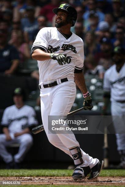 Domingo Santana of the Milwaukee Brewers lines out in the first inning against the New York Mets at Miller Park on May 27, 2018 in Milwaukee,...