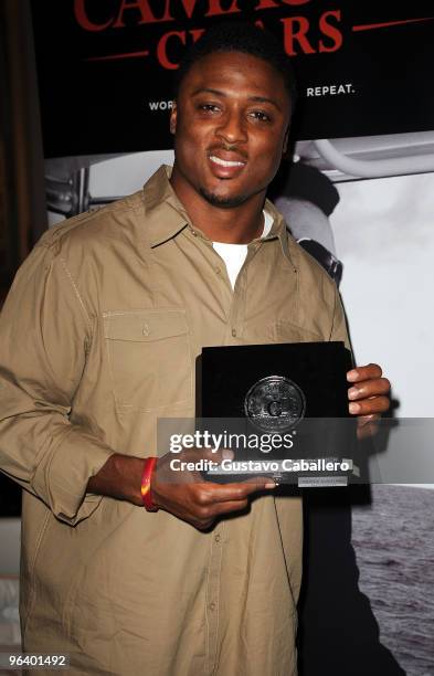 Player Warrick Dunn attends the GBK Gift Lounge at Player's Press Pre-Super Bowl Party at Sagamore Hotel on February 3, 2010 in Miami Beach, Florida.