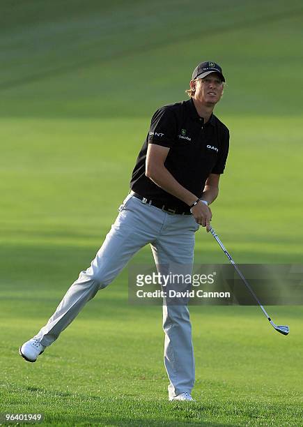 Maarten Lafeber of The Netherlands plays his second shot at the par 4, 12th hole during the first round of the 2010 Omega Dubai Desert Classic on the...