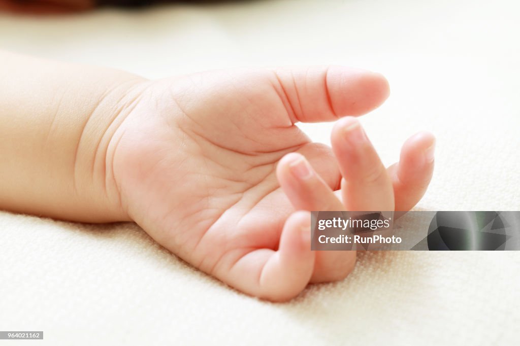 Close up of baby hand