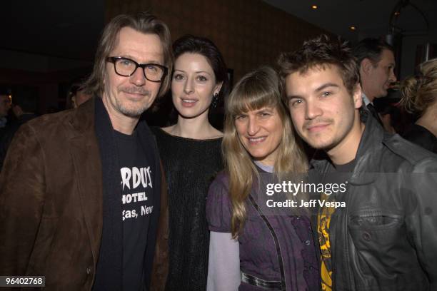 Actor Gary Oldman, wife Alexandra Edenborough, director Catherine Hardwicke and actor Emile Hirsch attend the "Have a Heart for Haiti" event held at...