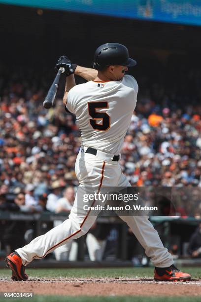 Nick Hundley of the San Francisco Giants at bat against the Colorado Rockies during the sixth inning at AT&T Park on May 20, 2018 in San Francisco,...