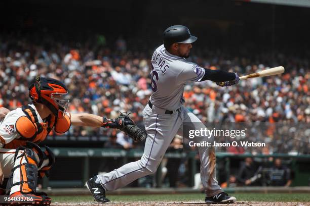 Noel Cuevas of the Colorado Rockies at bat against the San Francisco Giants during the fourth inning at AT&T Park on May 20, 2018 in San Francisco,...