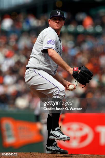 Jake McGee of the Colorado Rockies pitches against the San Francisco Giants during the seventh inning at AT&T Park on May 20, 2018 in San Francisco,...