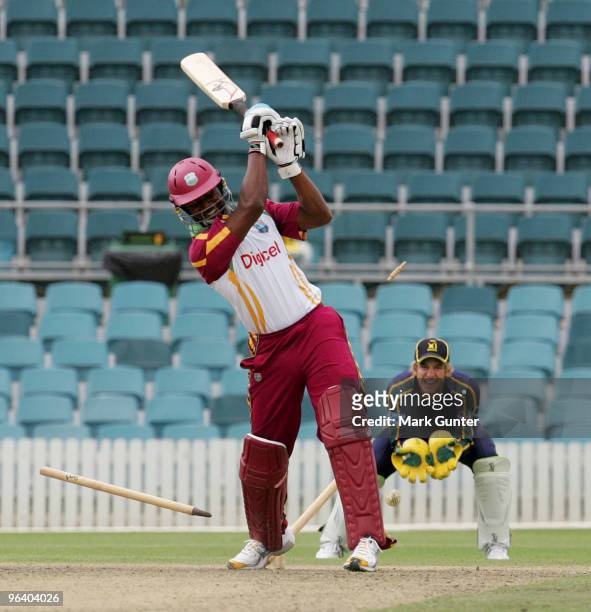 Dwayne Smith playing for the West Indies is clean bowled during the one day tour match between the Prime Minister's XI and the West Indies, at Manuka...