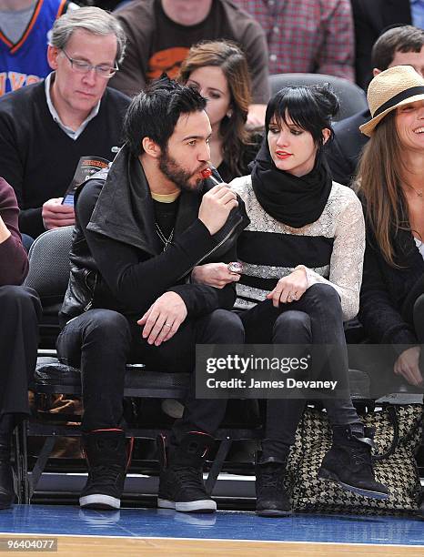 Pete Wentz and Ashlee Simpson Wentz attend the Washington Wizards vs. New York Knicks basketball game at Madison Square Garden on February 3, 2010 in...