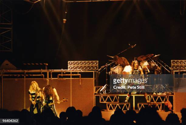Dave Murray, Steve Harris and Bruce Dickinson of Iron Maiden perform on stage at Hammersmith Odeon on May 26th, 1983 in London United Kingdom.