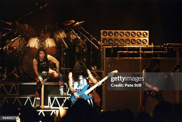 Bruce Dickinson, Steve Harris and Adrian Smith of Iron Maiden perform on stage at Hammersmith Odeon on May 26th, 1983 in London United Kingdom.