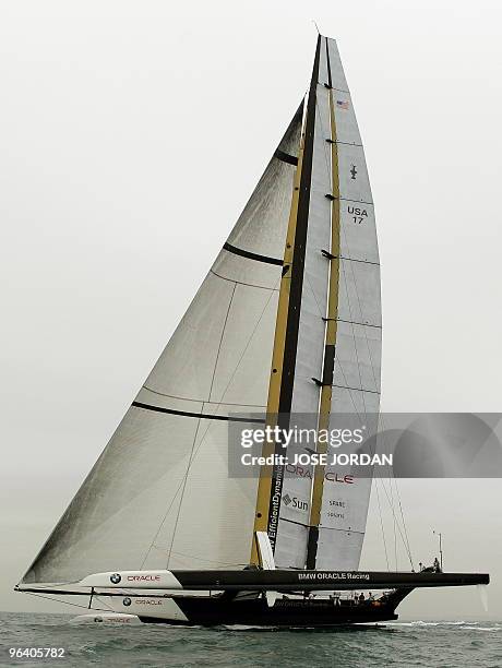Challenger Oracle giant trimaran sails on February 04, 2010 during a training session off Valencia's coast. Swiss defender Alinghi is to face US...
