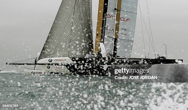 Challenger Oracle giant trimaran sails on February 04, 2010 during a training session off Valencia's coast. Swiss defender Alinghi is to face US...