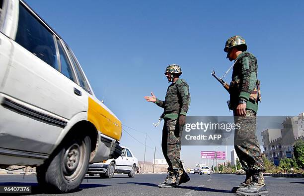 Yemeni soldiers man a checkpoint in Sanaa on February 4, 2010. Radical Yemeni cleric Anwar al-Awlaqi has praised a Christmas Day attempt to blow up a...