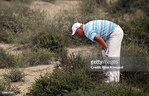 Richard Finch of England on the par four 8th hole during the first round the Omega Dubai Desert Classic on the Majlis Course at the Emirates Golf...