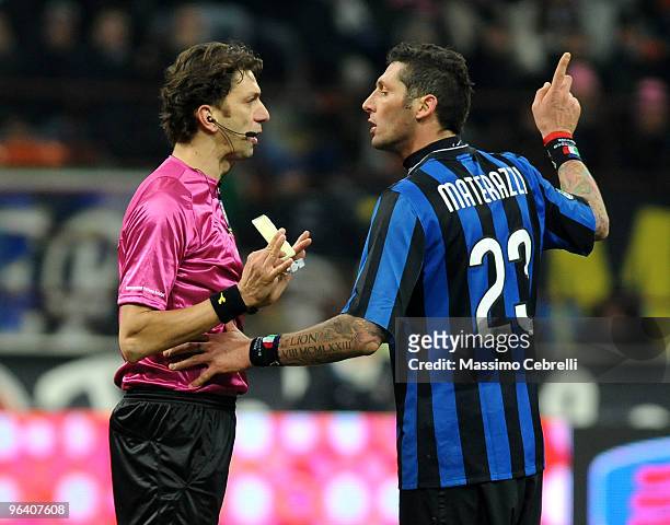 The referee Paolo Tagliavento talks with Marco Materazzi of Internazionale Milan during the first leg semifinal Tim Cup between FC Internazionale...