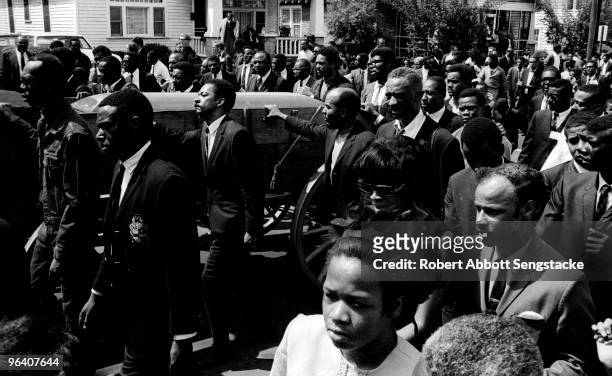 View of the casket of assassinated Civil Rights leader Dr. Martin Luther King Jr., borne on a mule-drawn cart, during a massive funeral procession...
