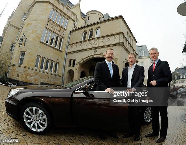 Burkhard Wagner , Director of Mercedes Benz Frankfurt Heerstrasse and Alexander Kuehmichel , Salesmanager attend the handover of a new Mercedes Benz...