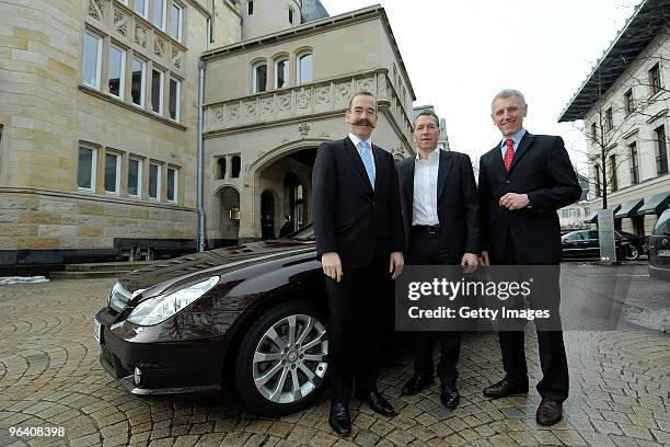 Burkhard Wagner , Director of Mercedes Benz Frankfurt Heerstrasse and Alexander Kuehmichel , Salesmanager attend the handover of a new Mercedes Benz...