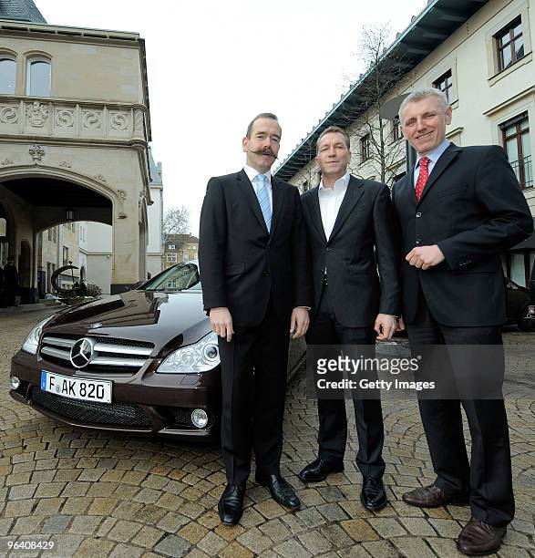 Burkhard Wagner , Director of Mercedes Benz Frankfurt Heerstrasse and Alexander Kuehmichel , Salesmanager attend the handover of a new Mercedes Benz...