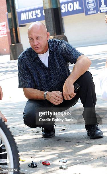 Stuart F. Wilson, Bruce Willis stunt double, on location for "A Couple Of Dicks" on the streets of Brooklyn on July 25, 2009 in New York City.