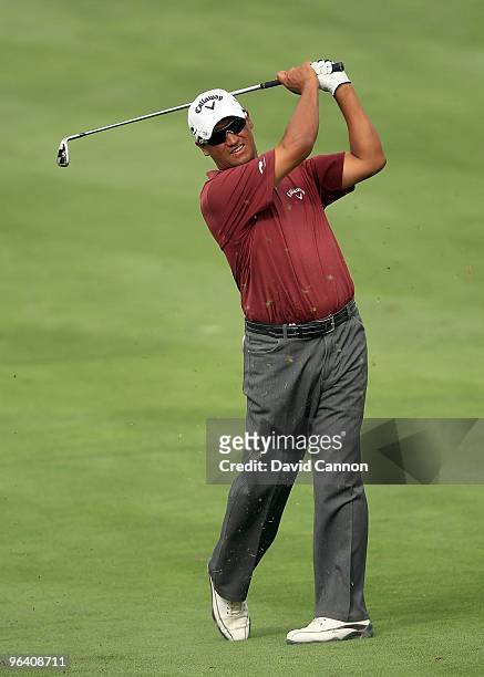 Michael Campbell of New Zealand plays his second shot to the par 4, 14th hole during the first round of the 2010 Omega Dubai Desert Classic on the...