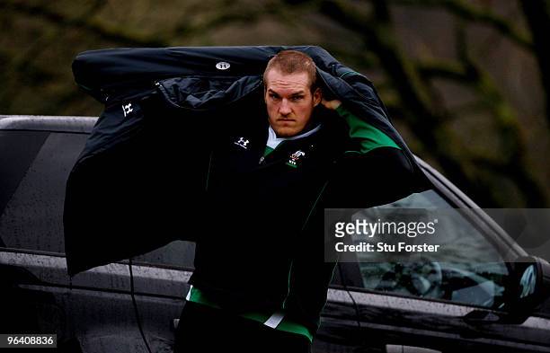 Wales prop Gethin Jenkins puts on his coat after being ruled out of Saturday's RBS 6 nations game against England because of injury during Wales...