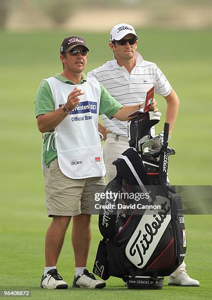 Gregory Bourdy of France plays his second shot to the par 4, 9th hole during the first round of the 2010 Omega Dubai Desert Classic on the Majilis...