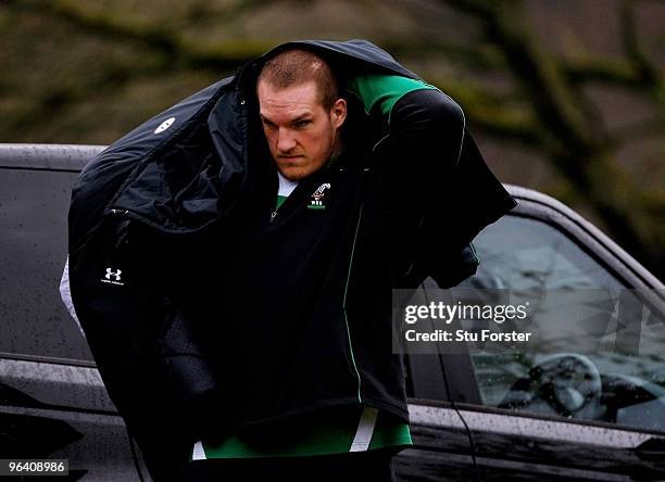 Wales prop Gethin Jenkins puts on his coat after being ruled out of Saturday's RBS 6 nations game against England because of injury during Wales...