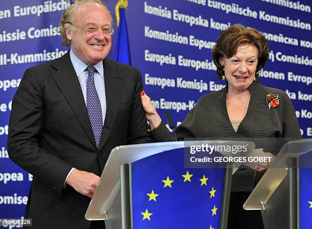 Commissioner for Competiton Neelie Kroes and Chief Executive Officer of italian company ENI Paolo Scaroni give a press conference on February 4, 2010...