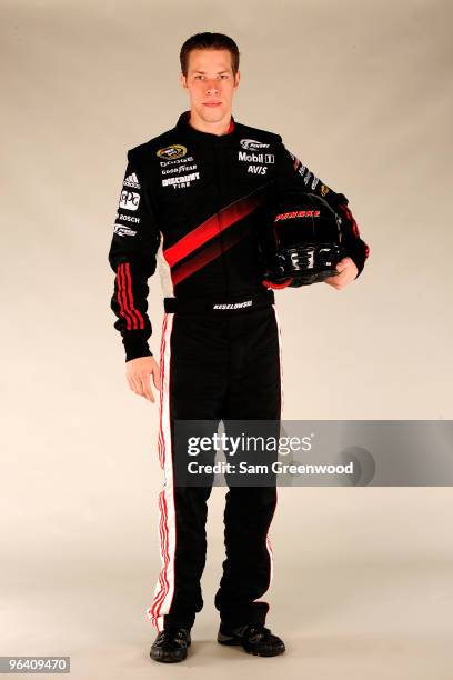 Brad Keselowski, driver of the Penske Racing Dodge, poses during NASCAR media day at Daytona International Speedway on February 4, 2010 in Daytona...