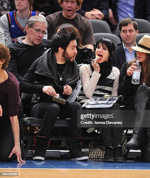 Pete Wentz and Ashlee Simpson Wentz attend the Washington Wizards vs. New York Knicks basketball game at Madison Square Garden on February 3, 2010 in...