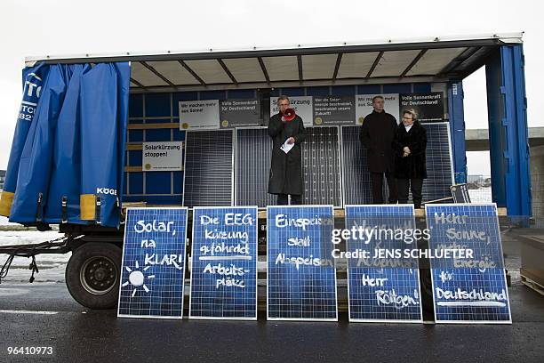 Anton Milner , CEO of photovoltaic cell manufacturer Q-Cell, speaks to demonstrators in front of the industrial area Solarvalley in...