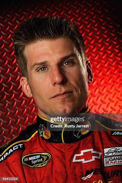 Jamie McMurray, driver of the Bass Pro Shops/Tracker Boats Chevrolet, poses during NASCAR media day at Daytona International Speedway on February 4,...