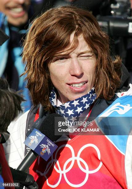 Halfpipe snowboarder Shaun White answers questions after winning the Men's snowboard Halfpipe final on the second day of the Turin 2006 Winter...