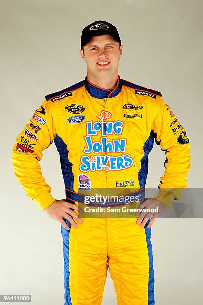 Travis Kvapil, driver of the Long John Silver's Ford, poses during NASCAR media day at Daytona International Speedway on February 4, 2010 in Daytona...