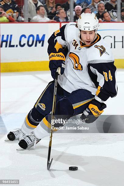 Defenseman Chris Butler of the Buffalo Sabres skates with the puck against the Pittsburgh Penguins on February 1, 2010 at Mellon Arena in Pittsburgh,...