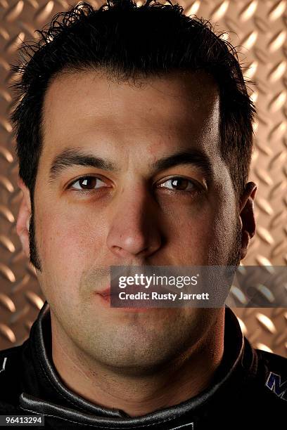 Sam Hornish Jr., driver of the Mobil 1 Dodge, poses during NASCAR media day at Daytona International Speedway on February 4, 2010 in Daytona Beach,...