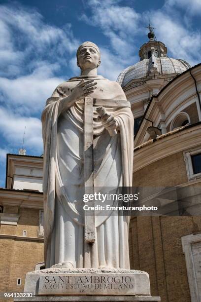 statue of priest in front of a church building,rome. - emreturanphoto stock-fotos und bilder