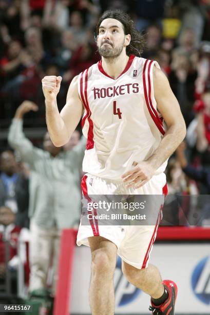 Luis Scola of the Houston Rockets celebrates as he runs down court during the game against the Milwaukee Bucks at Toyota Center on January 18, 2010...