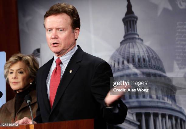 Sen. James Webb speaks as Sen. Barbara Boxer looks on during a news conference on Capitol Hill February 4, 2010 in Washington, DC. The Senators...