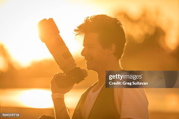 young sunset photographer - ipswich queensland stock-fotos und bilder