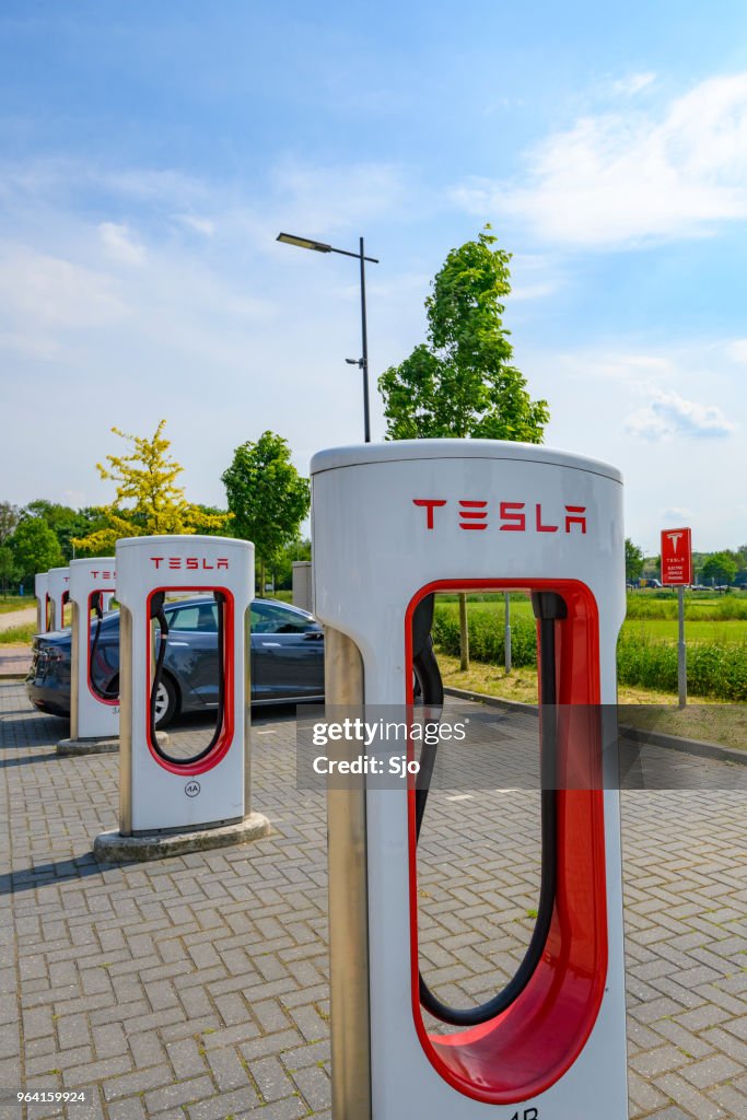 Tesla Electric Car Supercharger Charging Station High-Res Stock Photo ...