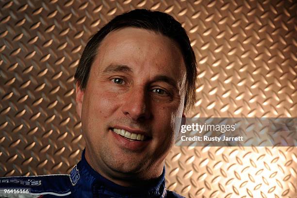 David Reutimann, driver of the Aaron�s Dream Machine Toyota, poses during NASCAR media day at Daytona International Speedway on February 4, 2010 in...