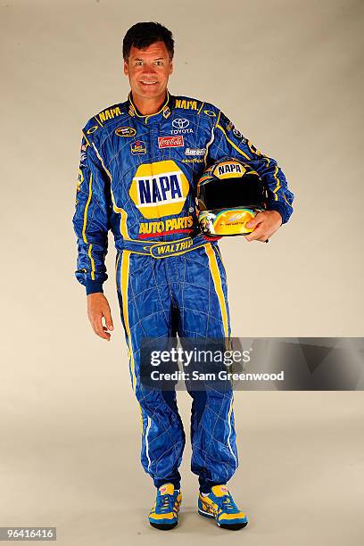 Michael Waltrip, driver of the NAPA Auto Parts Toyota, poses during NASCAR media day at Daytona International Speedway on February 4, 2010 in Daytona...