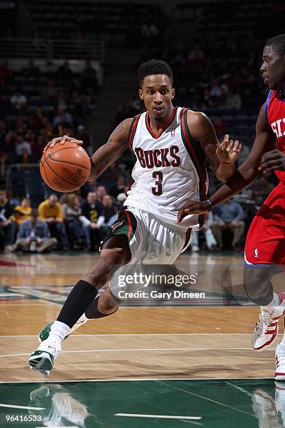 Brandon Jennings of the Milwaukee Bucks drives to the basket against Jrue Holiday of the Philadelphia 76ers during the game on January 27, 2010 at...