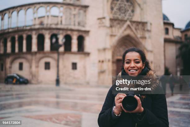 mixed race woman at plaza de la virgen,spain - la virgen stock pictures, royalty-free photos & images
