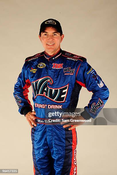 Mike Bliss, driver of the Wave Energy Drink Chevrolet, poses during NASCAR media day at Daytona International Speedway on February 4, 2010 in Daytona...