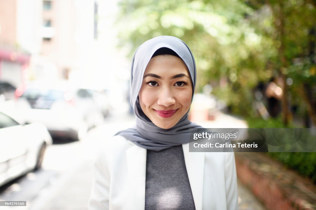 Portrait of a confident Muslim business woman on the street